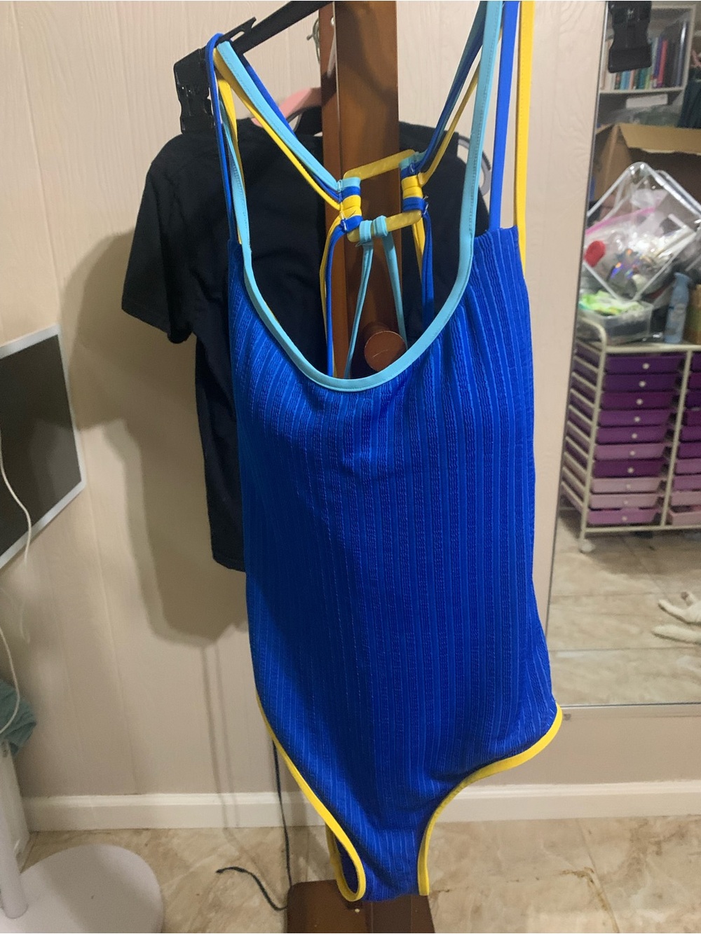 Woman Blue One-Piece Swimsuit with Yellow Trim